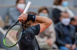 -包含世界网球队险胜日本网球队，西西帕斯绝境逆转的词条